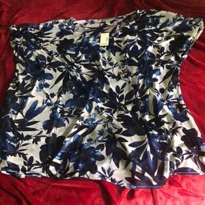 Blue flowered, open sleeve over shirt.